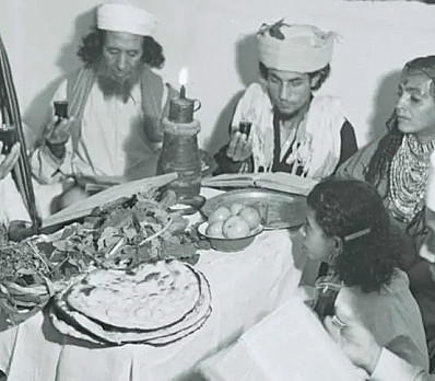 Yemenite Habani Family has seder in Tel Aviv, 1946. Photo by Zoltan Kluger.